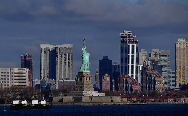 The Statue of Liberty is seen from the Staten Island Ferry on January 04, 2021 in New York City. (Photo by Angela Weiss / AFP)