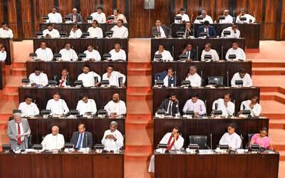 Sri Lankan President Ranil Wickremesinghe, left, speaking during the budget presentation at the parliamentary complex in Colombo. EPA