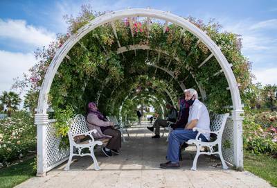 Elderly people sit on benches in the Maltepe Orhangazi city park in Istanbul, Turkey.  EPA