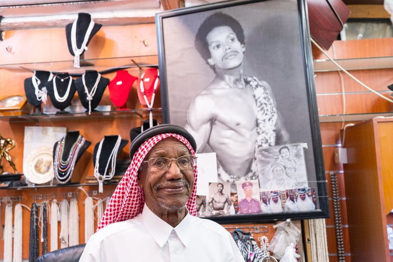 Saad Ismail Al Jassem, among the oldest pearl divers in Qatar, stands by his shop. Olga Stefatou/ The National 