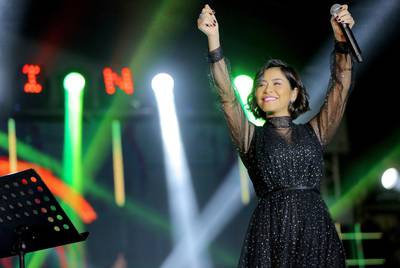 In this Dec. 31, 2018 photo, Egyptian singer Sherine Abdel-Wahab performs during New Years' Eve, in Cairo, Egypt. Abdel-Wahab has been banned from performing in her home country after suggesting that it does not respect free speech. (AP Photo/Mahmoud Abdel Nasser)