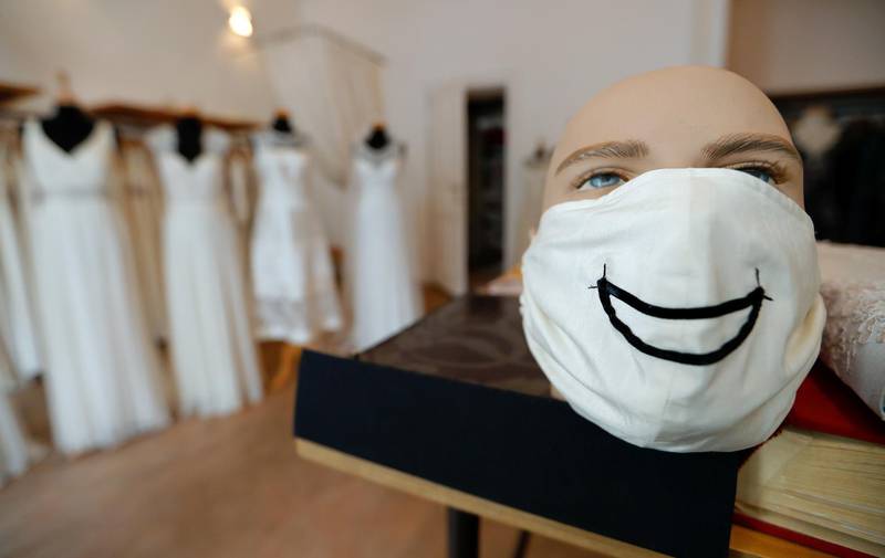 Face masks for wedding dresses, tailored by fashion designer Friederike Jorzig are seen in her wedding dress shop, as the spread of the coronavirus disease (COVID-19) continues in Berlin, Germany. REUTERS