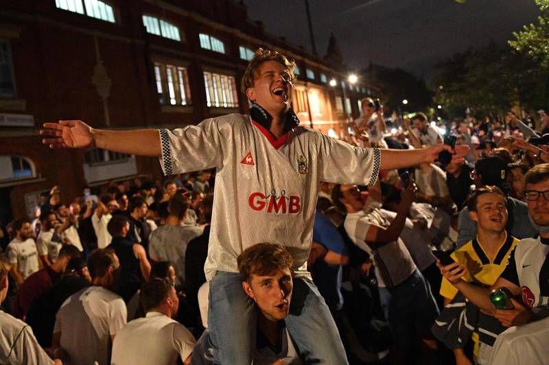 Fulham supporters gather outside  Craven Cottage. AFP