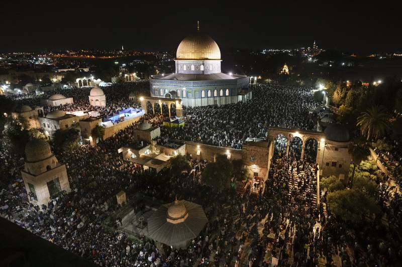 Palestinians pray during Laylat Al Qadr, or the Night of Power, in Al Aqsa Mosque compound, Jerusalem. AP