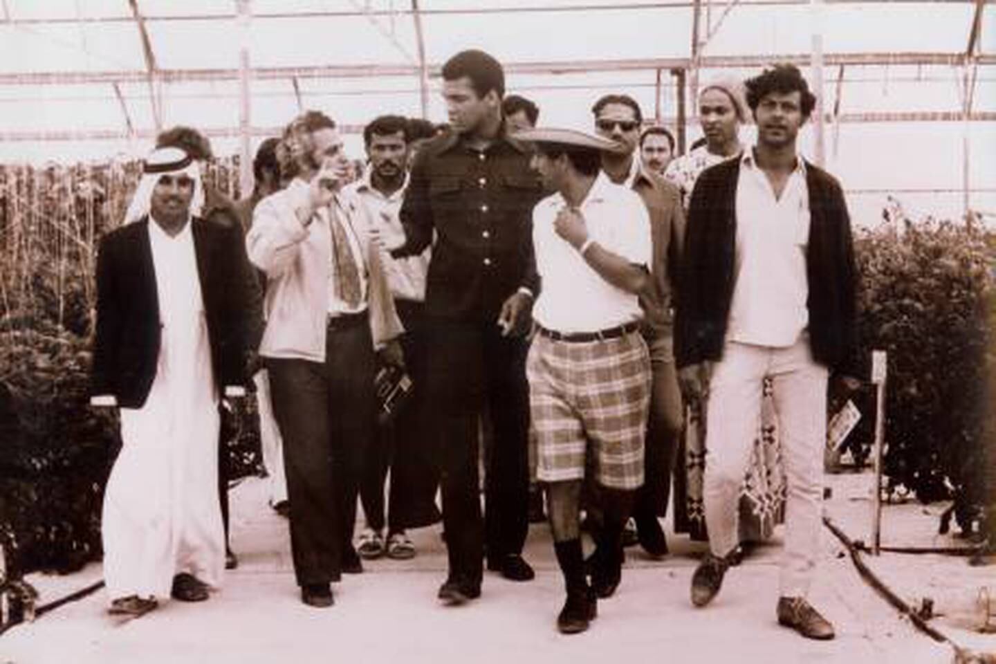 Boxing legend, Muhammad Ali, inspects hydroponically grown cucumbers on Saadiyat Island during a visit to Abu Dhabi in March 1974. Photo: Ali Kaddas Al Rumaithi