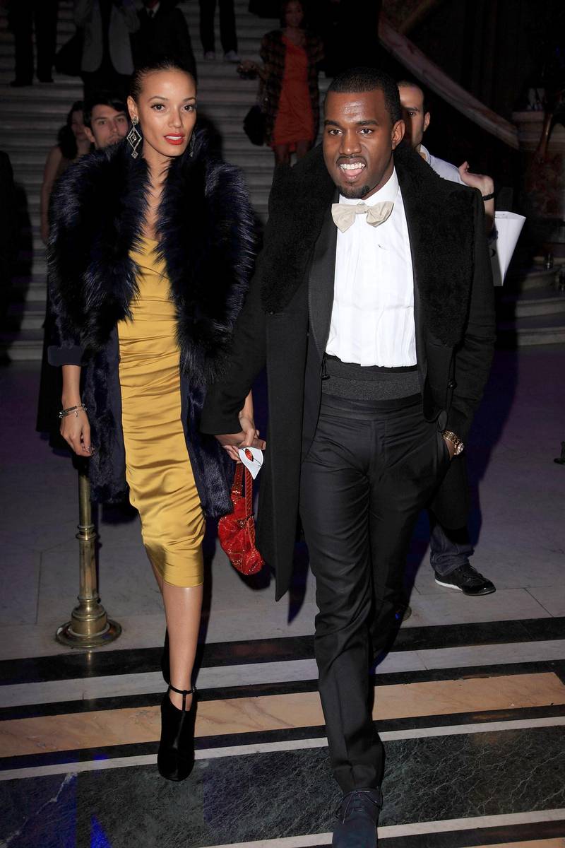 PARIS - OCTOBER 05:  Kanye West and Selita Ebanks (L) leave the Grazia Masquerade Ball at Opera Garnier on October 5, 2010 in Paris, France.  (Photo by Julien Hekimian/Getty Images)