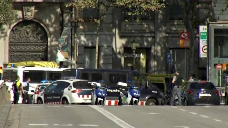 A still image from video shows a police cordon on a street in Barcelona, Spain. Reuters.