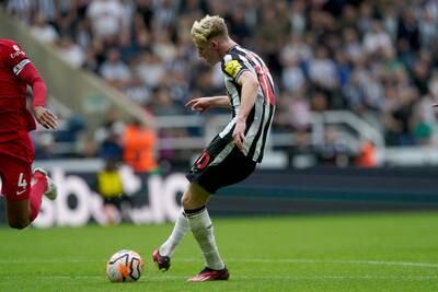 Newcastle United's Anthony Gordon scores his sides first goal. PA 