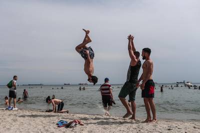 Syrian refugees enjoy their weekend at Menekse Beach, amid the ongoing pandemic in Istanbul, Turkey.  EPA