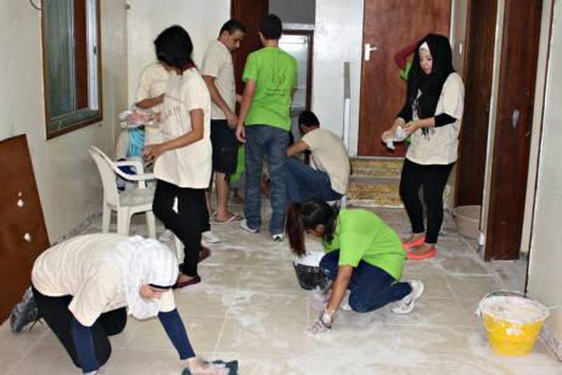 Students from the American University of Sharjah take part in renovation work at an orphanage in Sharjah Photo courtesy of the American University of Sharjah 