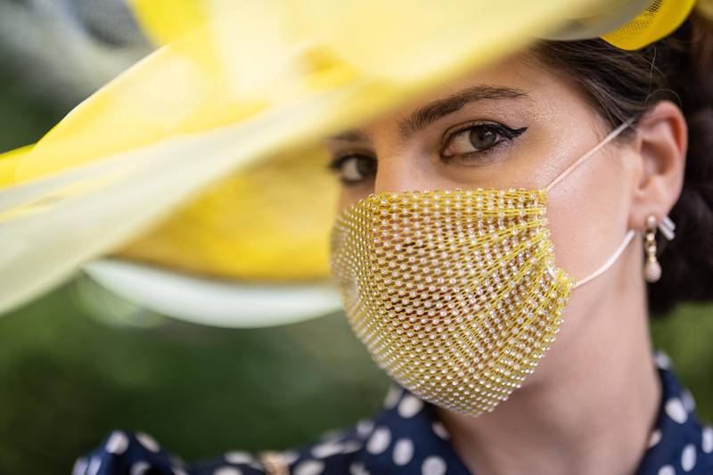 A racegoer shows off a fashionable face mask at Royal Ascot. Getty Images