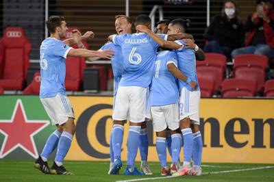 WASHINGTON, DC - APRIL 17: Valentin Castellanos #11 of New York City FC celebrates with his teammates after scoring a goal against the D.C. United in the first half of the MLS match at Audi Field on April 17, 2021 in Washington, DC.   Patrick McDermott/Getty Images/AFP (Photo by Patrick McDermott / GETTY IMAGES NORTH AMERICA / Getty Images via AFP)