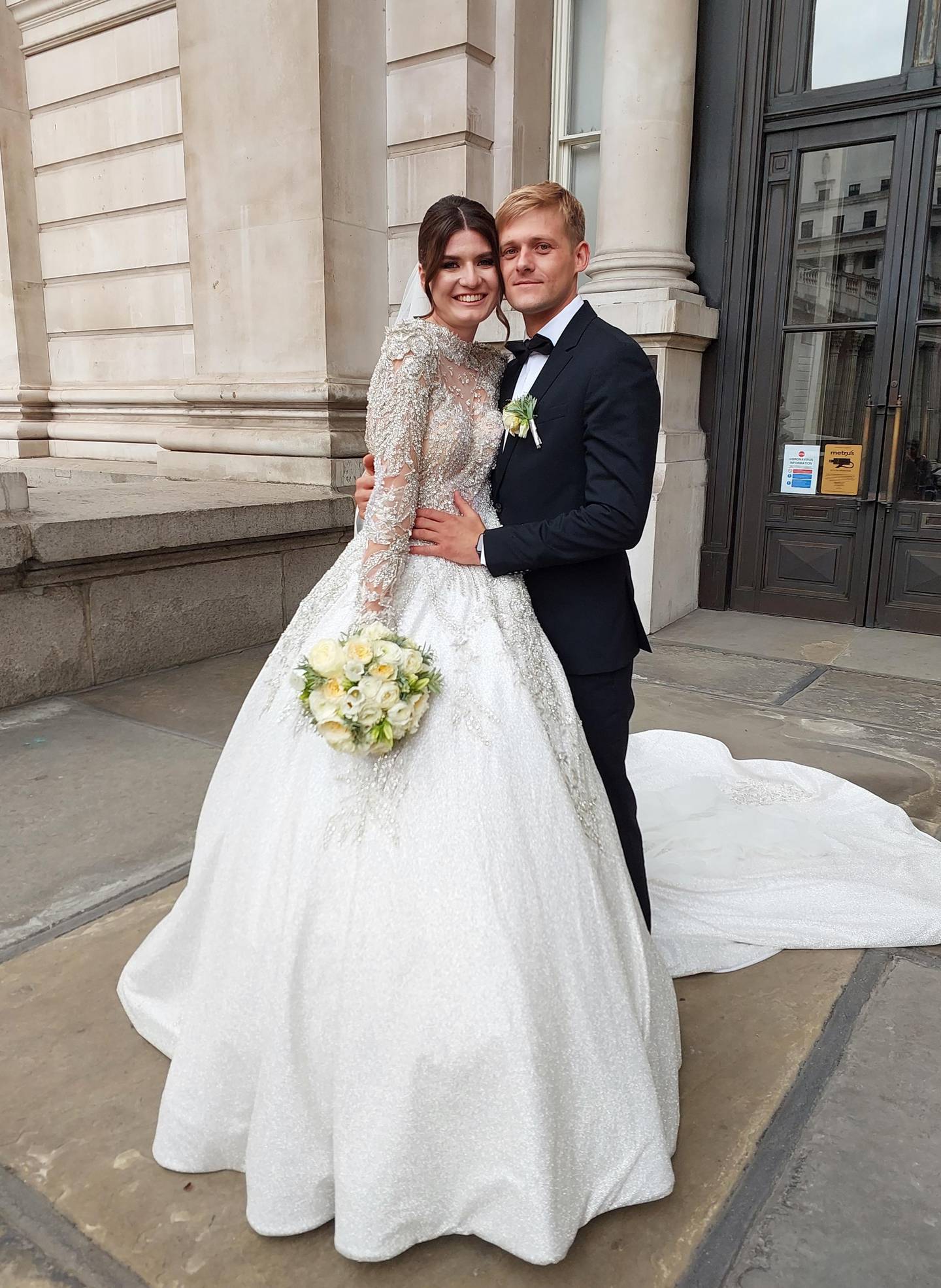 A real-life bride and groom outside the Halpern show in London. Sarah Maisey / The National 