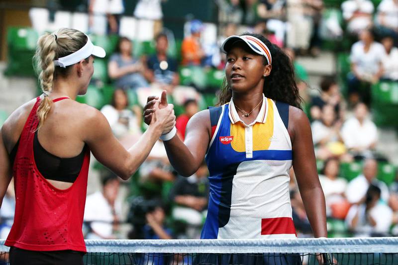 TOKYO, JAPAN - SEPTEMBER 18: Naomi Osaka of Japan shakes hands with Angelique Kerber of Germany after the women's singles match day one of the Toray Pan Pacific Open Tennis at Ariake Coliseum on September 18, 2017 in Tokyo, Japan.    (Photo by Koji Watanabe/Getty Images)