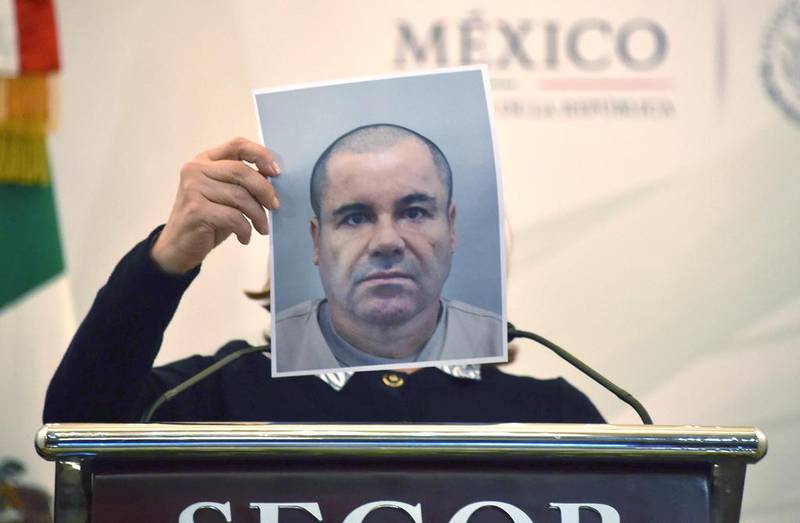 Mexico’s Attorney General Arely Gomez shows a picture of Joaquin ‘El Chapo’ Guzman. The Mexican drug kingpin has a US$3.8m reward on his head. Yuri Cortez / AFP Photo