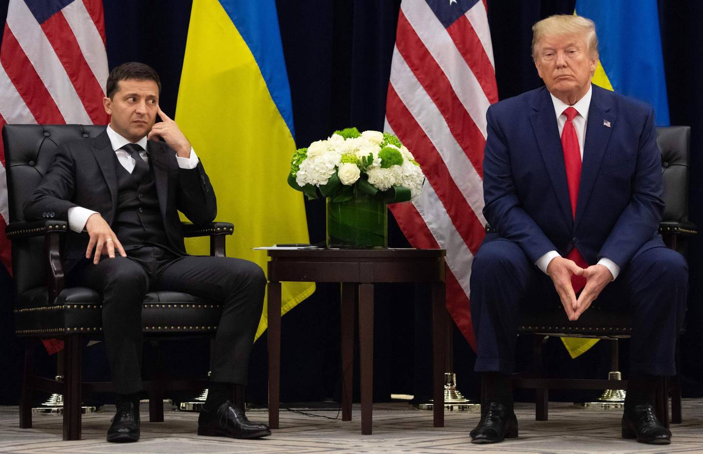 - AFP PICTURES OF THE YEAR 2019 - 

US President Donald Trump and Ukrainian President Volodymyr Zelensky looks on during a meeting in New York on September 25, 2019, on the sidelines of the United Nations General Assembly.  / AFP / SAUL LOEB
