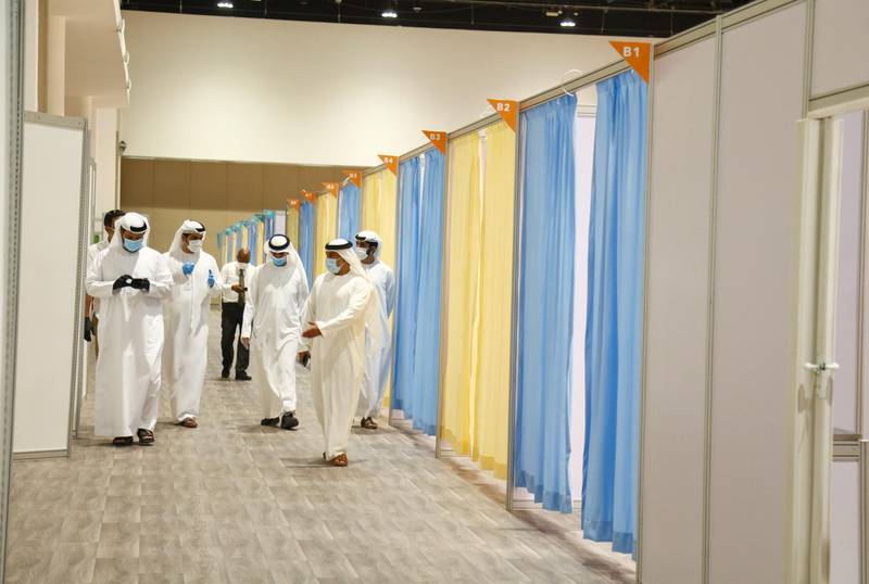 Workmen begin transforming Abu Dhabi National Exhibition Centre into a huge field hospital. Courtesy: Adnec