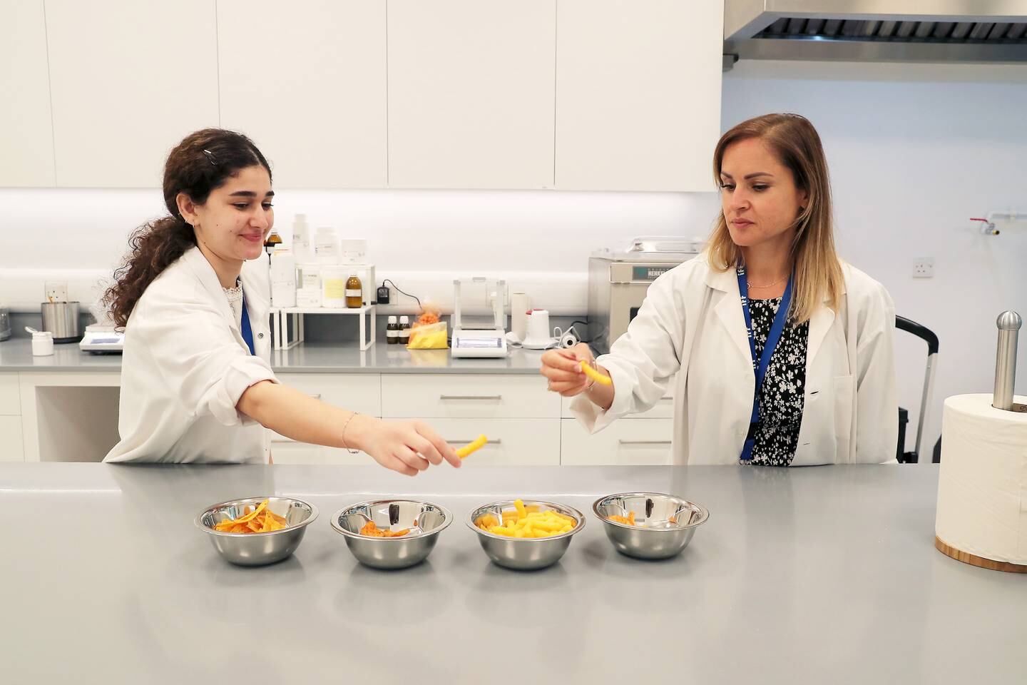 Aseel Taweel (L), laboratory assistant and Sahar Razmkhah, technical laboratory manager at International Flavours & Fragrances. Pawan Singh / The National