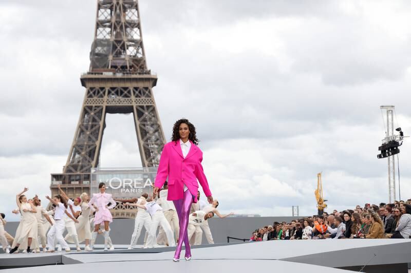 Cindy Bruna walks the runway for Le Defile L'Oreal Paris 2021. The beauty behemoth hosted a star-studded fashion show at Parvis des Droits de L’Homme, or Paved Forecourt of Human Rights in Paris. Getty Images