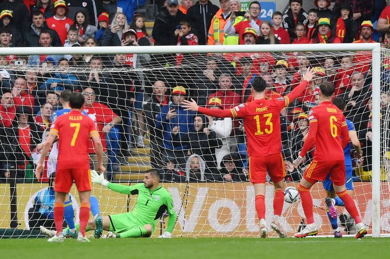 Ukraine goalkeeper Heorgiy Bushchan is beaten by Bale's deflected free-kick. Getty