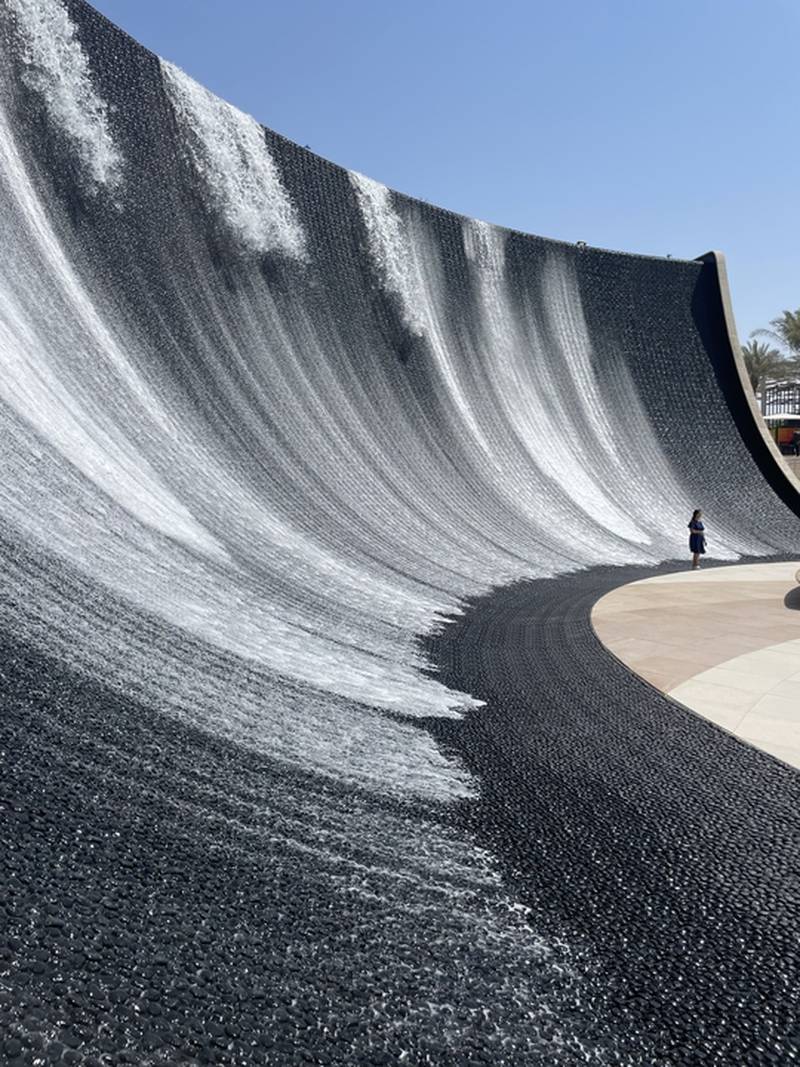 A water feature at Expo 2020 Dubai. Waves crashing down the walls in the circular arena can help to keep visitors cool. James Langton / The National