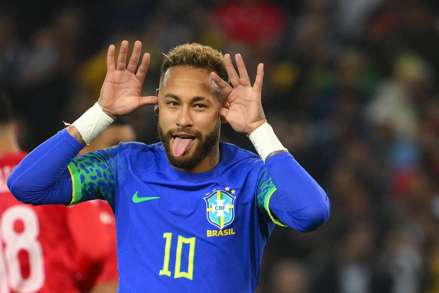 Neymar celebrates after scoring for Brazil against Tunisia at the Parc des Princes in Paris. AFP