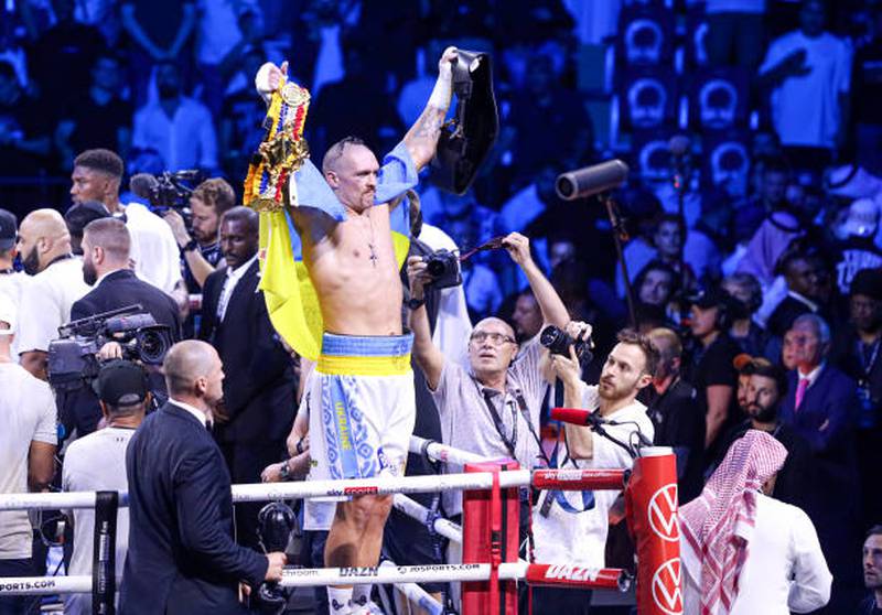 Oleksandr Usyk of Ukraine celebrates after beating Britain's Anthony Joshua in their heavyweight world title rematch at the King Abdullah Sports City Arena in Jeddah. Getty