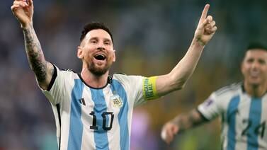An image that illustrates this article Midas touch of Messi sends Argentina into World Cup quarter-finals