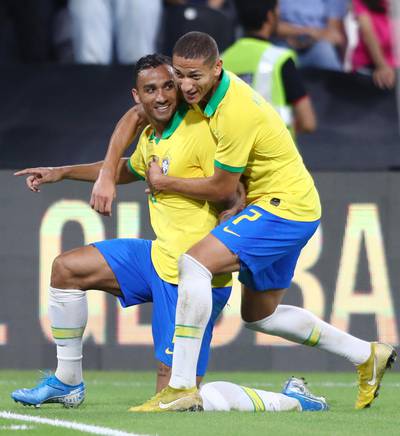 Brazil's Danilo, left, celebrates his goal with Richarlison. Getty