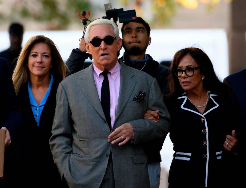 (FILES) In this file photo taken on November 5, 2019 Roger Stone, former adviser to US President Donald Trump, enters the E. Barrett Prettyman United States Court House with his wife Nydia (R) in Washington, DC. Donald Trump may have commuted Roger Stone's prison sentence but the president's longtime ally remains a convicted criminal, former special counsel Robert Mueller said on July 11, 2020. / AFP / Andrew CABALLERO-REYNOLDS
