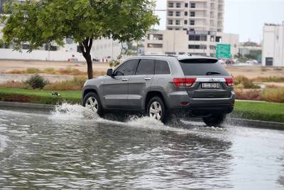 Waterlogged streets after heavy rain in the Al Furjan area of Dubai. Pawan Singh / The National