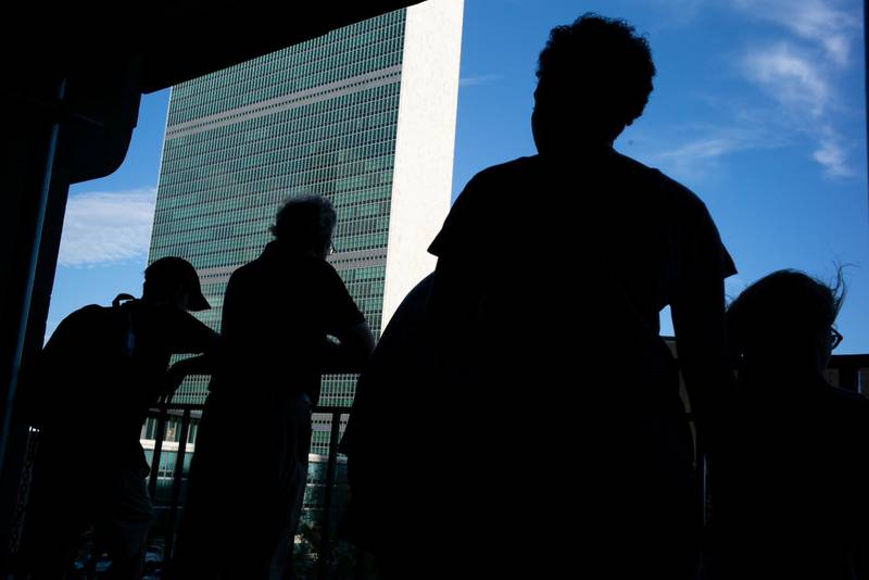 Onlookers stand on a promenade overlooking United Nations headquarters in New York on Wednesday, September 26, 2018. The 73rd session of U.N. General Assembly is in session this week, resulting in enhanced security measures by the NYPD, Secret Service and FBI.