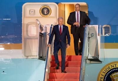 US President Joe Biden leaves Air Force One at Stansted Airport, Essex, on Sunday night. PA