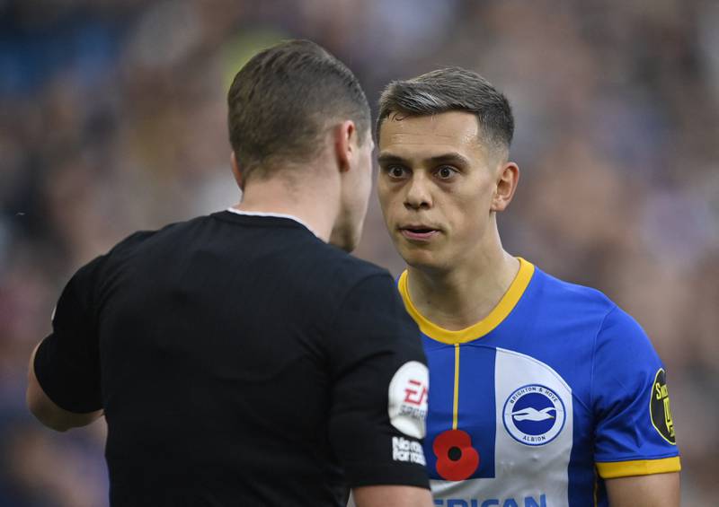 Brighton's Leandro Trossard appeals to referee Chris Kavanagh after his long-range goal is denied by VAR for an earlier foul. Reuters