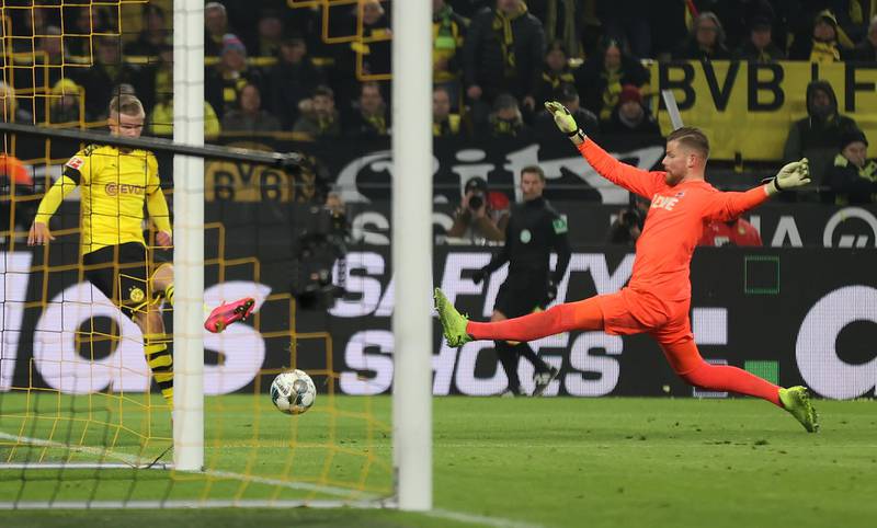 Dortmund's Erling Haaland (L) scores his second goal to make the final score 5-1. EPA