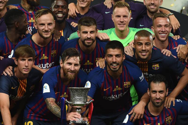 Barcelona celebrate their win in the Spanish Super Cup. AFP