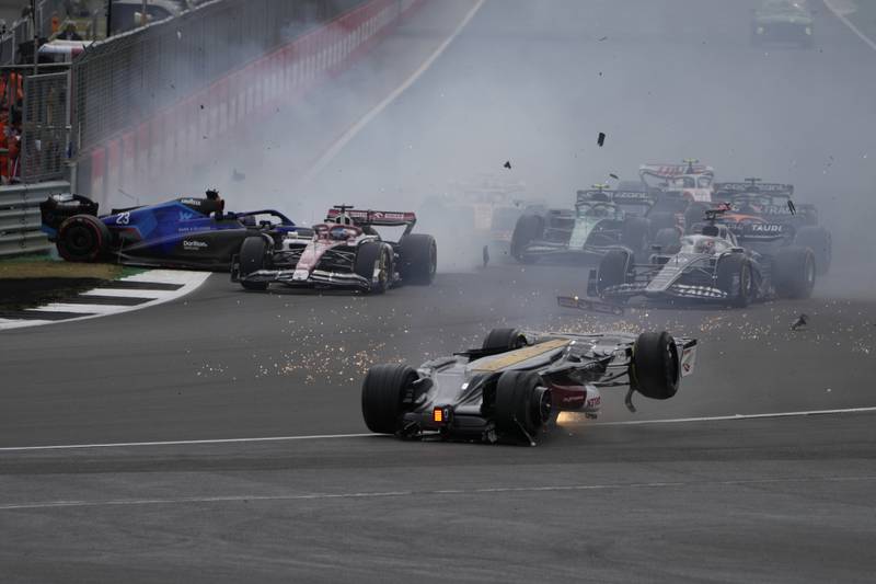 Alfa Romeo driver Guanyu Zhou crashes at the start of the British Grand Prix. AP