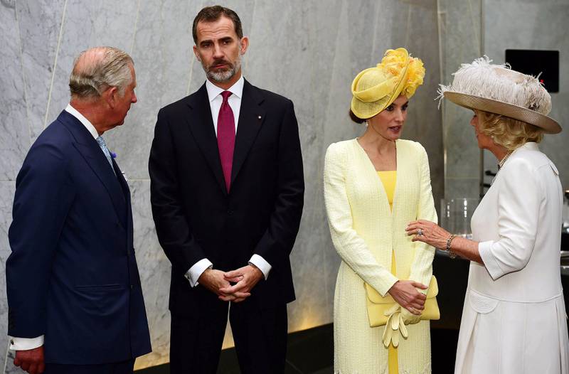 Prince Charles (L) and Camilla (R), Duchess of Cornwall greet King Felipe VI (2-L) and Queen Letizia (2-R) at their hotel in central London.