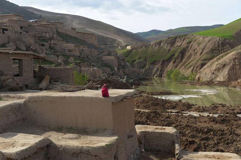 A landslide-affected Afghan villager looks on at the scene of the incident in the Argo district of Badakhshan, northern Afghanistan. Shah Marai / AFP
