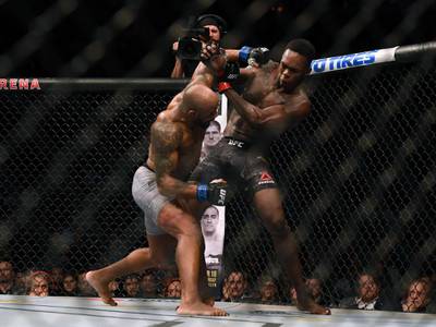 UFC 248 was the last fight night to take place, in Las Vegas on March 8, before the lockdown on sports events. Here Israel Adesanya fends off Yoel Romero during their middleweight title fight at T-Mobile Arena. AFP