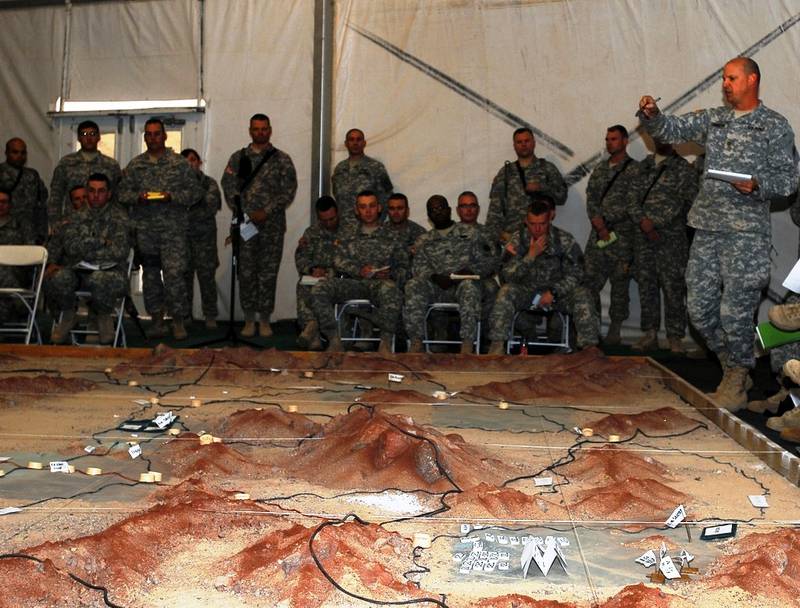 Members of the New York Army National Guard's 27th Infantry Brigade Combat Team review the operations plans during combined arms rehearsal. Photo: US Army