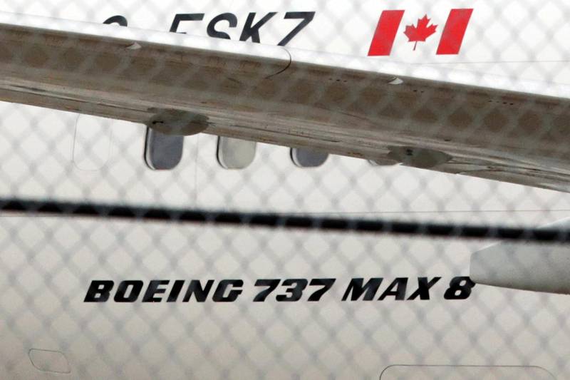 FILE PHOTO: An Air Canada Boeing 737 MAX 8 aircraft is seen on the ground at Toronto Pearson International Airport in Toronto, Ontario, Canada, March 13, 2019.  REUTERS/Chris Helgren/File Photo