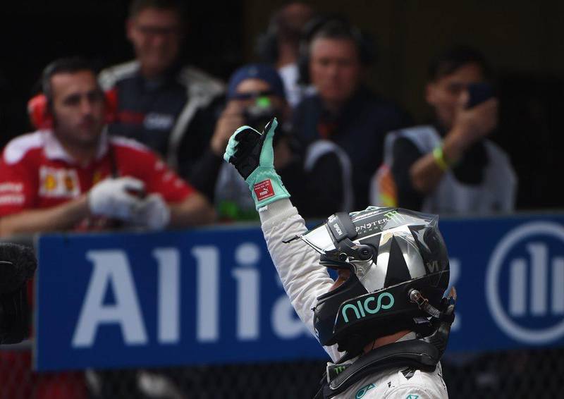 Mercedes driver Nico Rosberg celebrates after winning pole on Saturday for Sunday's Chinese Grand Prix in Shanghai. Greg Baker / AFP / April 16, 2016 