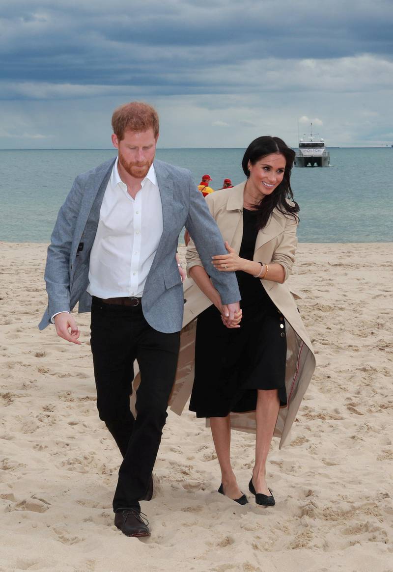 She wore a Club Monaco dress and Rothy's flats as well as a Martin Grant trench to visit a beach at Melbourne for a clean up operation on October 18. Ian Vogler/Pool via REUTERS