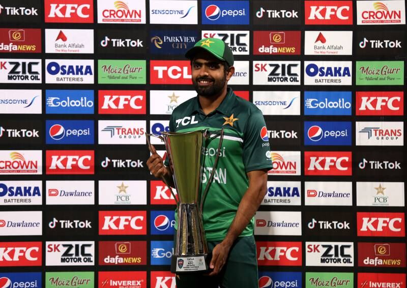 Pakistan's captain Babar Azam with the series trophy after scoring a century in the decider against Australia during the third ODI at the Gaddafi Cricket Stadium in Lahore on Saturday, April 2, 2022. EPA