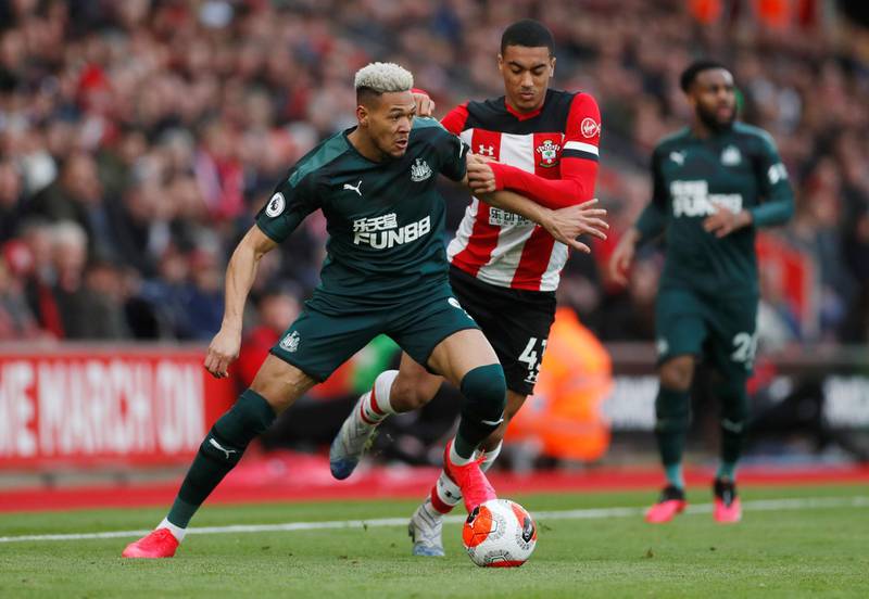 Joelinton in action with Southampton's Yan Valery during their Premier League victory St Mary's Stadium in March. Reuters