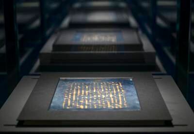 Folios of the Blue Quran pages displayed at the Letters of Light exhibition 
