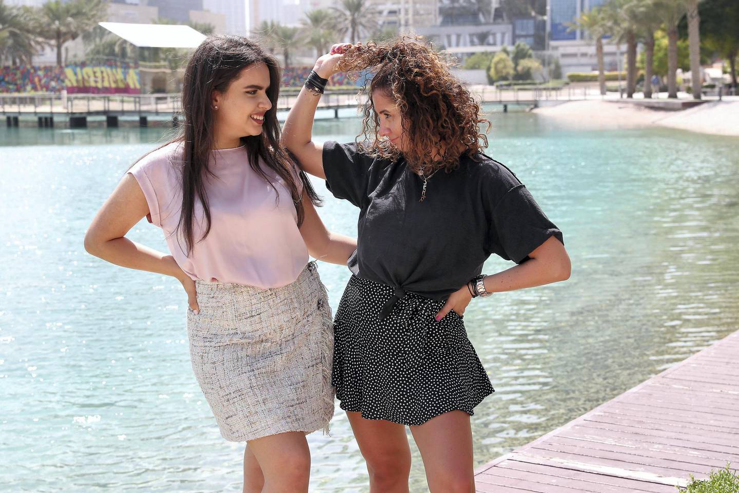 DUBAI,  UNITED ARAB EMIRATES , OCTOBER 14  – 2019 :- Maram Hussein ( left ) and Lana Makhzoumi ( right ) , co-hosts of one of the most popular podcasts in the Middle East  DXBabies at the Media City Park in Dubai. ( Pawan Singh / The National ) For Arts. Story by Ann Marie McQueen