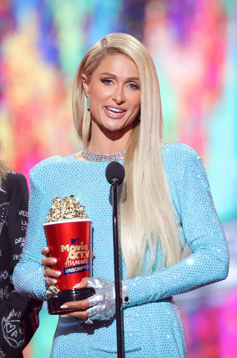 Paris Hilton accepts the Best Reality Return award onstage. AFP