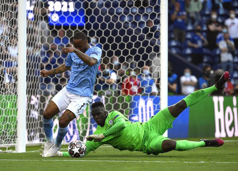 City forward Raheem Sterling sees an early chance saved by Chelsea  goalkeeper Edouard Mendy.